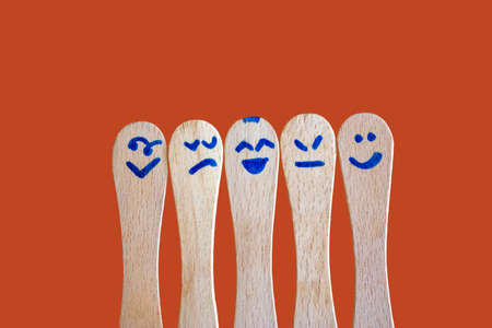 Group of ice cream sticks with smiley face.の写真素材
