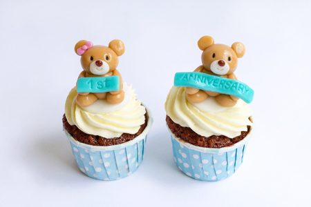 Anniversary cupcakes on white backgroundの写真素材