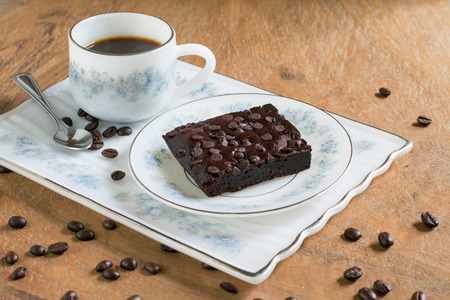 Hot coffee and brownie on wooden backgroundの写真素材