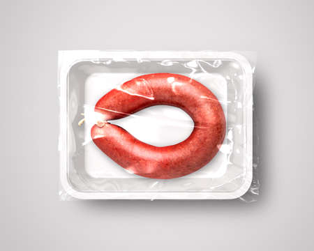 Food packaging isolated with grill sausage top viewの写真素材