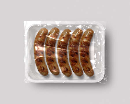 Food packaging isolated with grill sausage top viewの写真素材