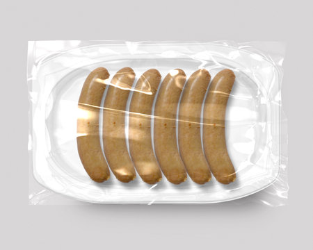 Food packaging isolated with grill sausage top viewの写真素材