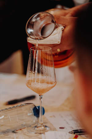 Red white and rose wine glass tasting in store restaurantの写真素材
