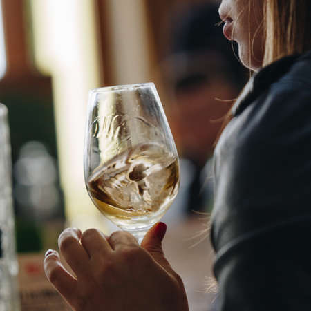 Red white and rose wine glass tasting in store restaurantの写真素材