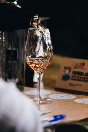 Red white and rose wine glass tasting in store restaurantの写真素材