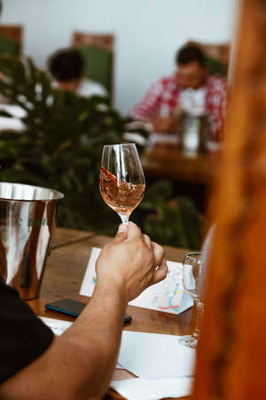 Red white and rose wine glass tasting in store restaurantの写真素材
