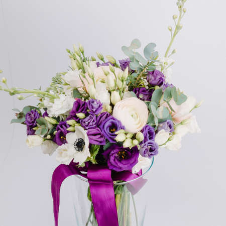 Bouquet Matiola ranunculus, anemone eustoma, wax flower.の写真素材