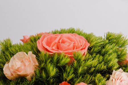 Bouquet of pink roses in two shades, carnation green dianthus