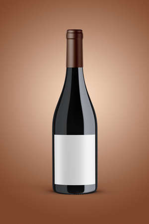 A bottle of red wine isolated on a orange background for mockup presentation projects.の写真素材