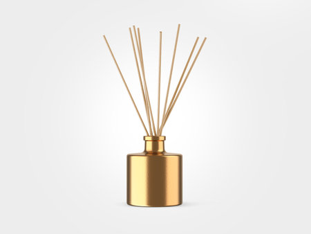 golden reed diffuser isolated on white backgroundの写真素材