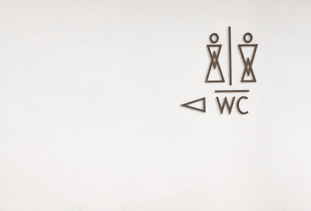 design pointer to the women and men  toilets with an arrowの写真素材