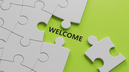 welcome on The white puzzle pieces with missing pieces. Business. Strategy.close up of The white puzzle pieces with missing pieces,Business Concept.3D rendering on green background.の写真素材