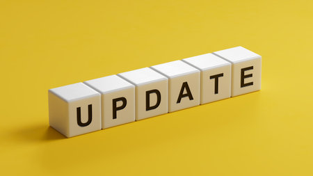 wooden cubes with word update. Investment in life insurance and healthcare concept.close up of wooden cubes,Business Concept.3D rendering on yellow background.の写真素材