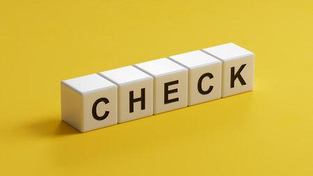 wooden cubes with CHECK business word. Mission, Vision and core values concept.close up of wooden cubes,Business Concept.3D rendering on yellow background.の写真素材