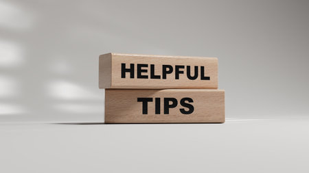 Helpful tips symbol. wooden blocks with words Helpful tips.Business and Helpful tips concept. Copy space.3D rendering on white background.の写真素材