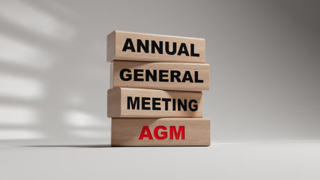 AGM - Annual general meeting symbol. Concept word AGM on wooden blocks. Business and AGM concept....