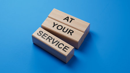 At your service symbol. wooden blocks with words At your service.Business and At your service...