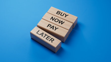 Buy now Pay later symbol. Concept word Buy now Pay later on wooden block.Business and Buy now Pay later concept.3D rendering on blue background.の写真素材