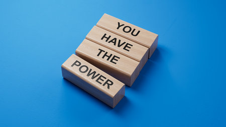 You have the Power symbol. Concept words You have the Power on wooden blocks.Business and You have the Power concept.Copy space.3D rendering on blue background.の写真素材