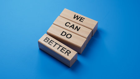 We Can Do Better symbol. Concept words We Can Do Better on wooden blocks.Business and We Can Do Better concept. Copy space.3D rendering on blue background.の写真素材