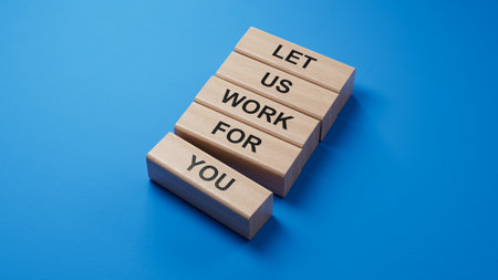 Let us work for you symbol. wooden blocks with words Let us work for you.Business and Let us work for you concept. Copy space.3D rendering on blue background.の写真素材