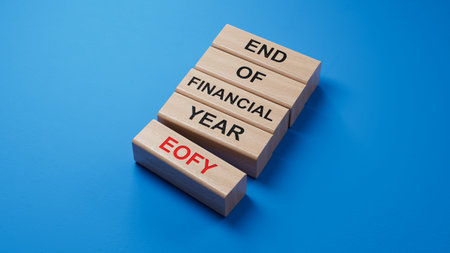 eofy END OF FINANCIAL YEAR word on wooden blocks. wooden blocks. Copy space.3D rendering on blue...
