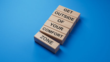 Get outside of your comfort zone symbol. Concept words Get outside of your comfort zone on wooden...