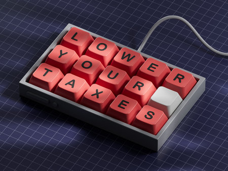 Text LOWER YOUR TAXES writing in Computer keyboard keys. Business concept. Computer keyboard keys....