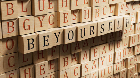 wooden blocks with Be yourself lettering. Top view.close up of wooden blocks,Business Concept.3D...