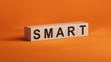 wooden cube block with smart business word.close up of wooden elements,Business Concept.3D rendering on orange background.の写真素材
