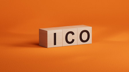 letters of the alphabet of ICO on wooden cubes. ICO - short for initial coin offering.close up of...
