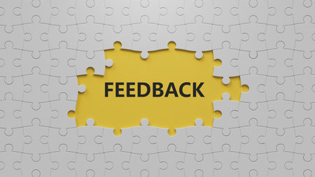 Word FEEDBACK made with The white puzzle pieces with missing pieces.business concept.close up of The...
