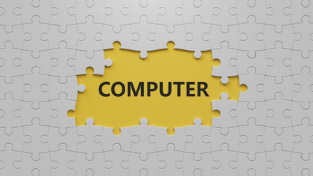 computer.The white puzzle pieces with missing pieces spelling.Flat lay view from above on The white...
