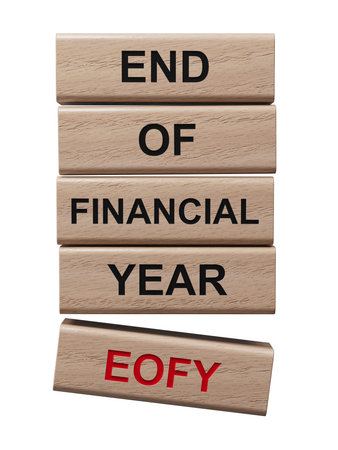 eofy END OF FINANCIAL YEAR word on wooden blocks. wooden blocks. Copy space.Supports PNG files with...
