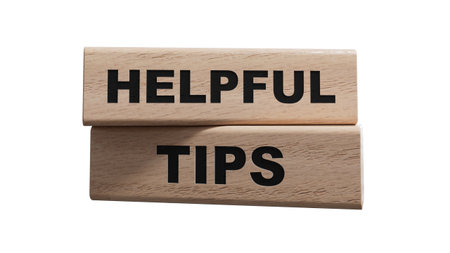 Helpful tips symbol. wooden blocks with words Helpful tips.Business and Helpful tips concept. Copy space.Supports PNG files with transparent backgrounds.の写真素材