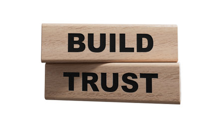 Build trust symbol. wooden blocks with words Build trust.Business and Build trust concept. Copy space. Conceptual image.Supports PNG files with transparent backgrounds.の写真素材