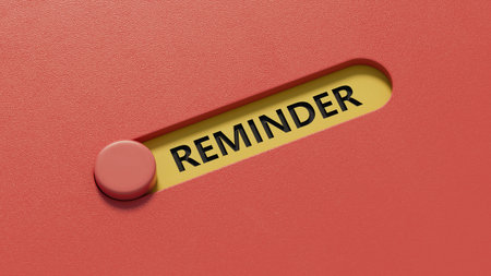 slide switch spelling with text REMINDER. financial market. financing.close up of slide switch...