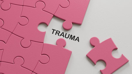 puzzle pieces with missing pieces with trauma word.close up of puzzle pieces with missing pieces.3D rendering.の写真素材