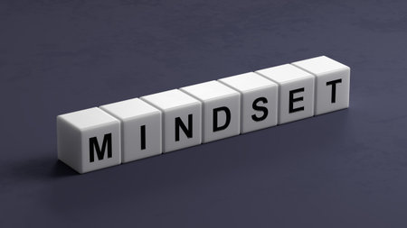 Mindset is a word written in blue letters on wooden cubes. Mindset text on wooden cubes.close up of wooden cubes,Business Concept.3D rendering.の写真素材