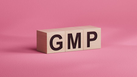 GMP - text on wooden cubes.3D rendering.の写真素材