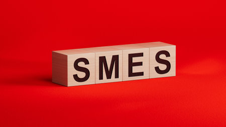 Small and medium-sized enterprises Word Written In wooden cubes.close up of wooden cubes,Business Concept.3D rendering.の写真素材