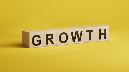GROWTH word written on wooden cubes. Concept for your design.close up of wooden cubes,Business Concept.3D rendering.の写真素材
