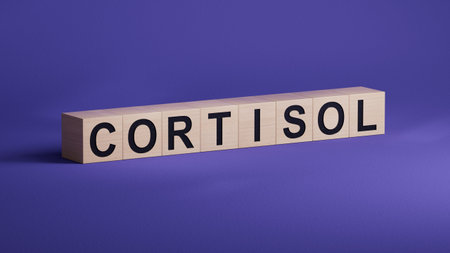 wooden cubes with text CORTISOL. close up of wooden cubes.