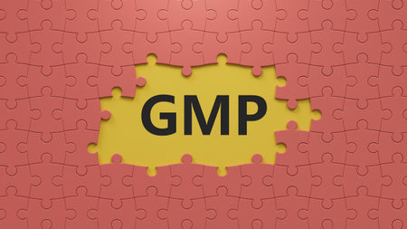 GMP - text on puzzle pieces with missing pieces.3D rendering.の写真素材
