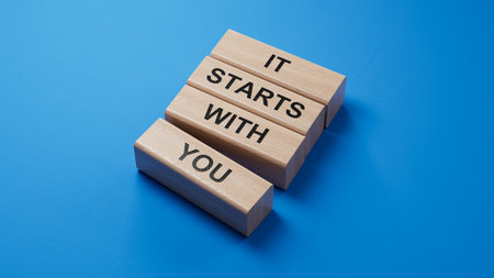 It starts with you symbol. wooden blocks with words It starts with you.Business and It starts with you concept. Copy space.3D rendering on blue background.の写真素材