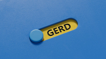 The word GERD is written on slide switch. Medical concept. Close up of slide switch on blue...
