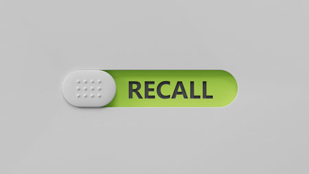 Recall written on slide switch on wooden background. Close up of slide switch. 3D rendering on green...