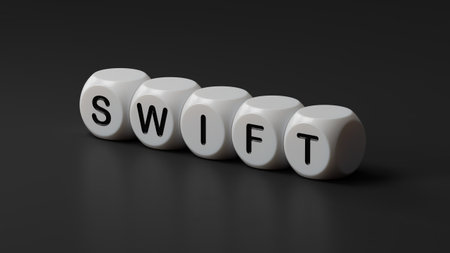 wooden dice with swift business word.close up of wooden dice,Business Concept.3D rendering on black background.の写真素材