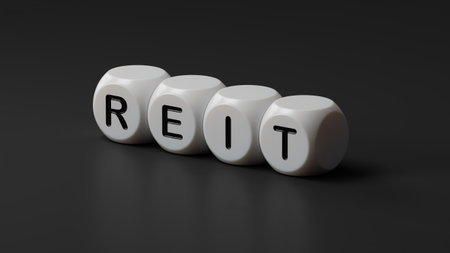 Word reit on wooden dice with copy space.close up of wooden dice,Business Concept.3D rendering on black background.の写真素材