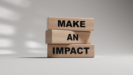 Make an impact symbol. Concept word Make an impact on wooden blocks.Business and Make an impact concept. Copy space.3D rendering on white background.の写真素材